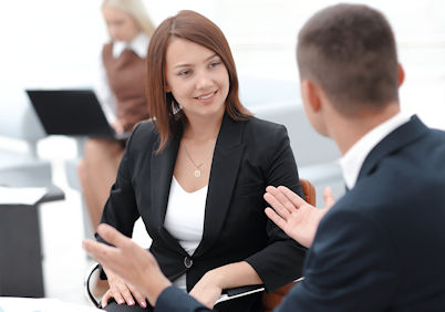 Man talking to Woman about Human Resources issue