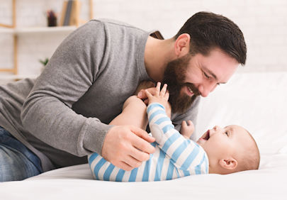 Father with newborn child